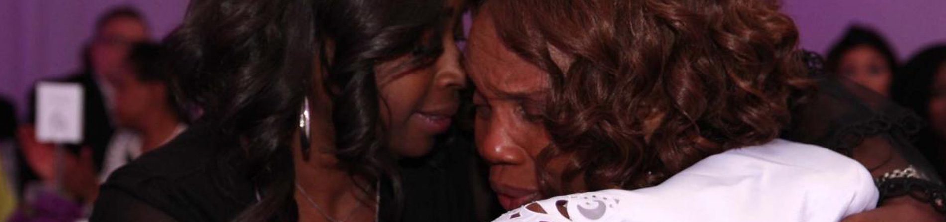 Two women hugging